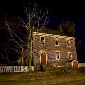 Haunted building at night in Williamsburg, Virginia